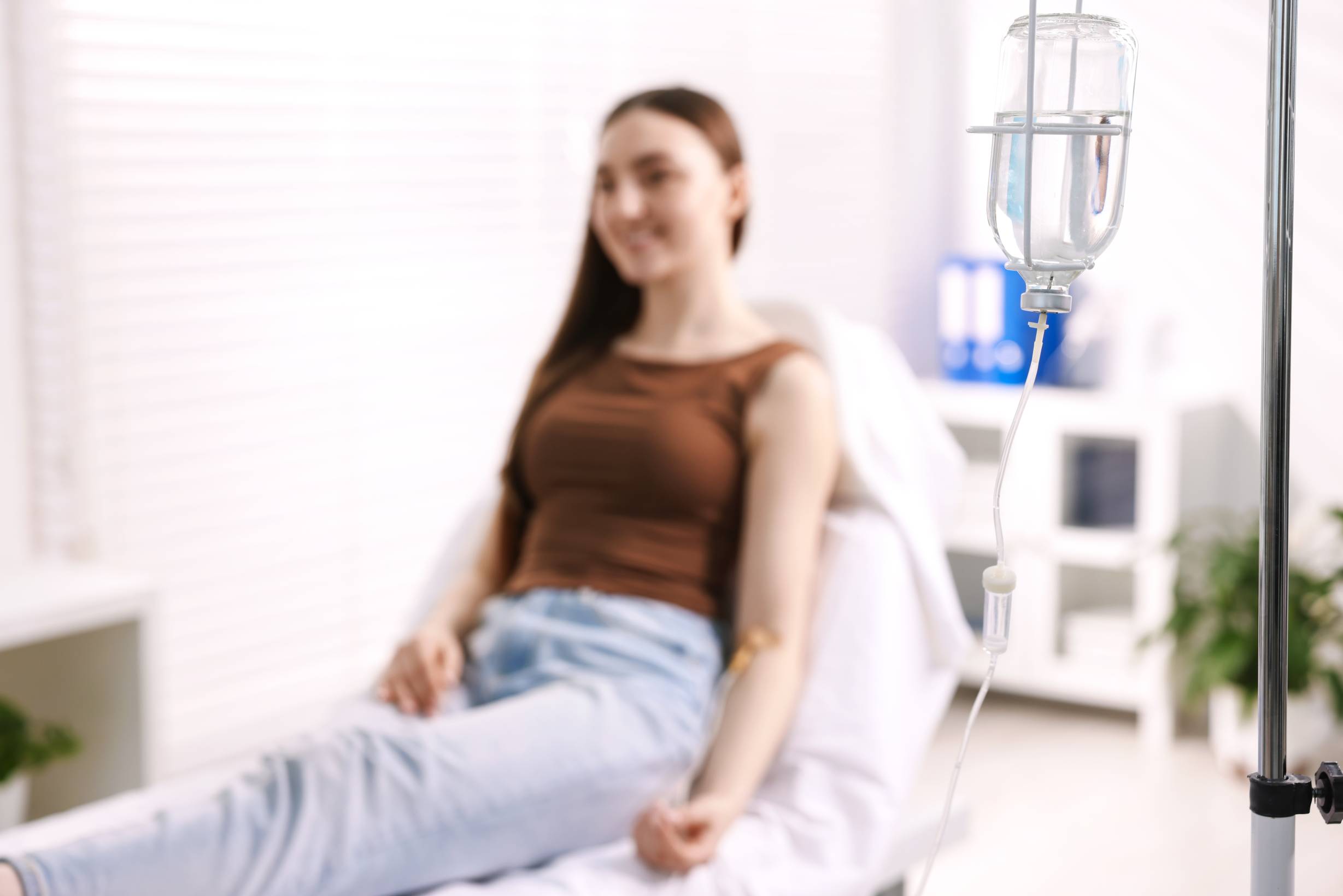 Fast Track to Feeling Great: What is the Purpose of IV Therapy and How Can it Help You? 1 woman with iv drip in hospital selective focus 2026 05 25 15 04 50 utc 1