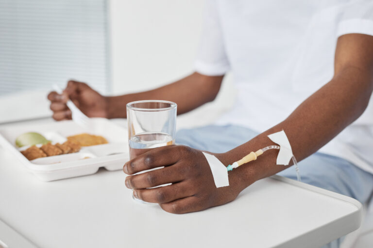 african american man eating food in hospital 2025 03 09 04 53 55 utc