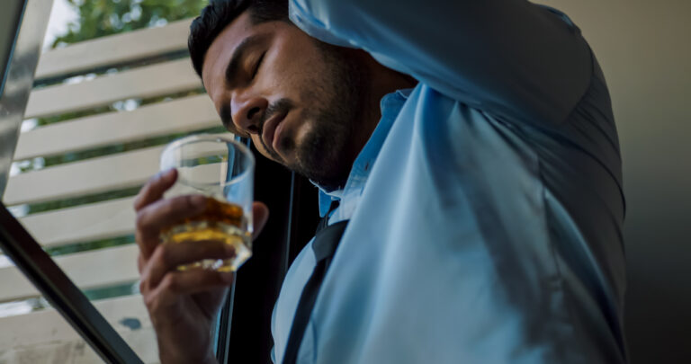 a businessman drinking alcohol to relieve depresse 2026 01 08 05 44 11 utc