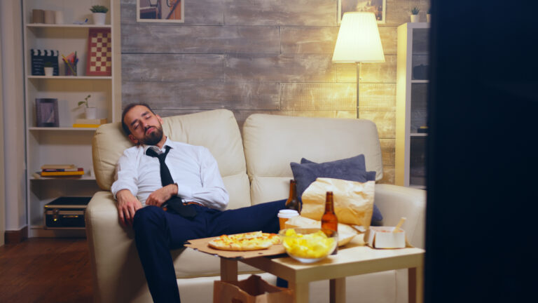 young businessman in suit falling asleep on the co 2026 01 08 05 55 17 utc
