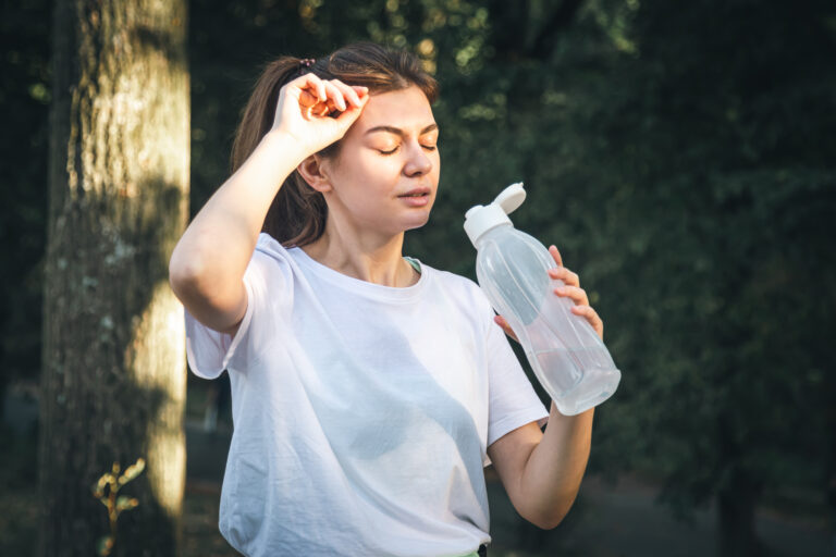 attractive young woman drinks water after jogging 2026 01 08 23 50 18 utc