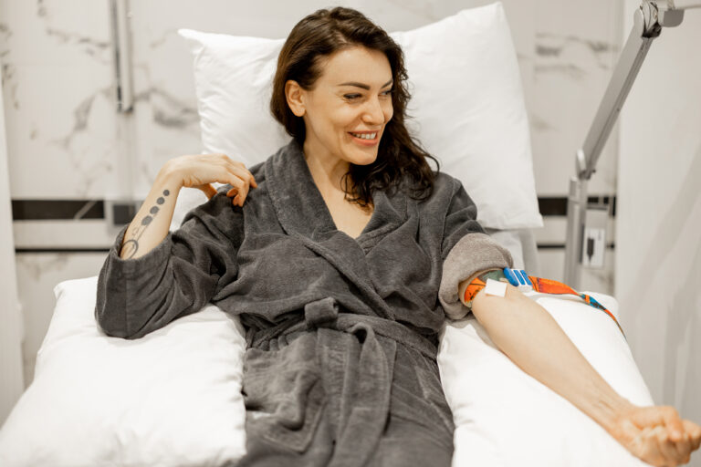 happy woman in bathrobe after blood test procedure 2026 01 08 08 01 00 utc