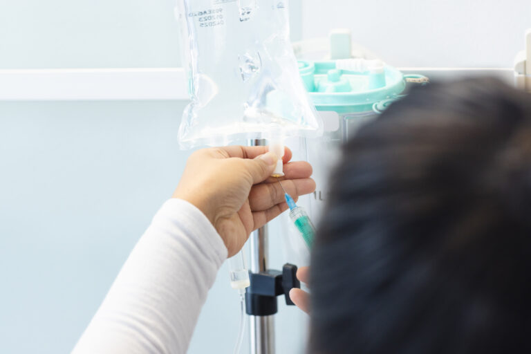 biracial female doctor preparing drip in sunny hos 2026 01 09 09 46 41 utc