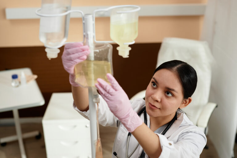 nurse setting up equipment for iv drip 2026 03 09 01 52 54 utc