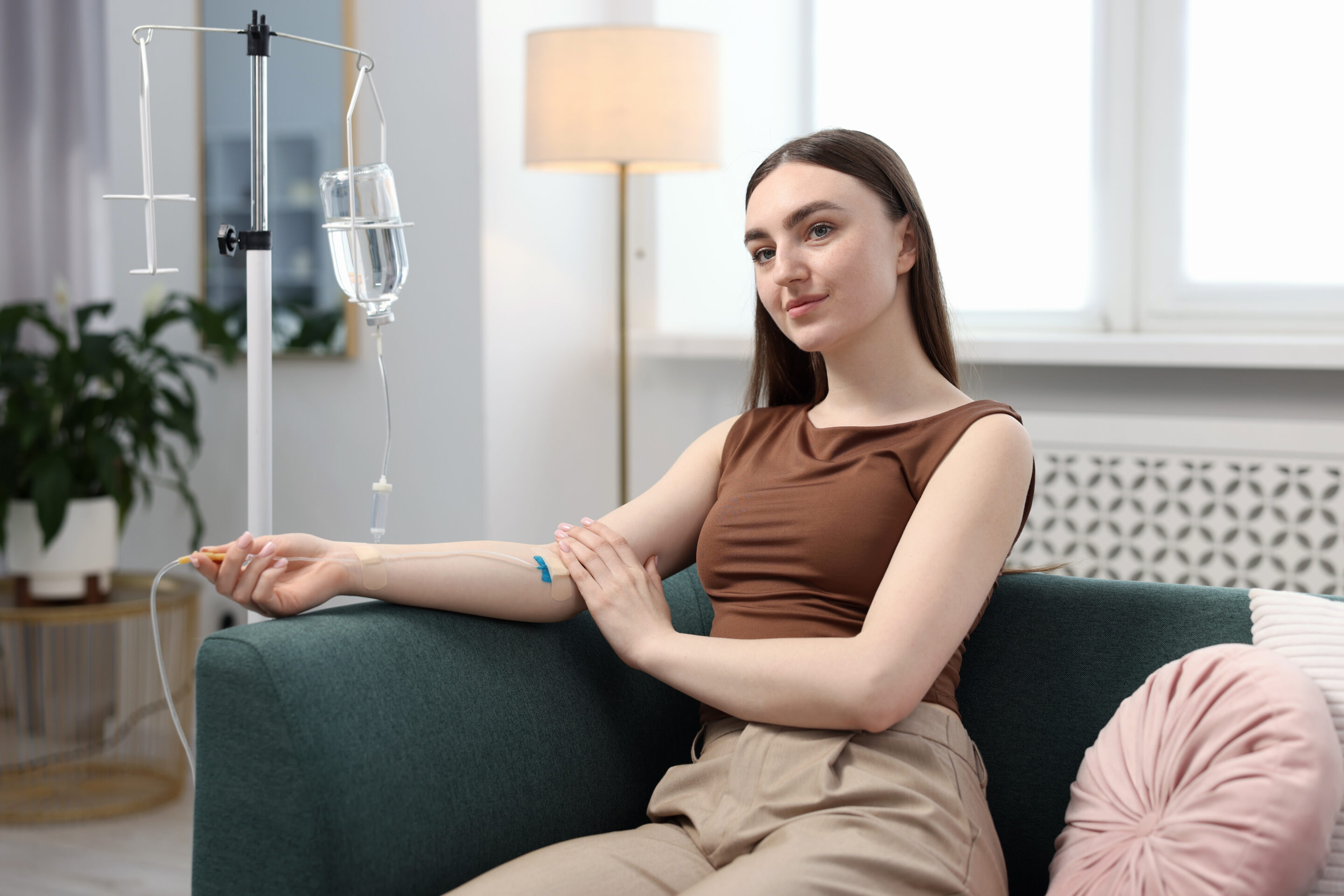 young woman receiving iv vitamin therapy at home w 2026 05 25 17 54 21 utc scaled